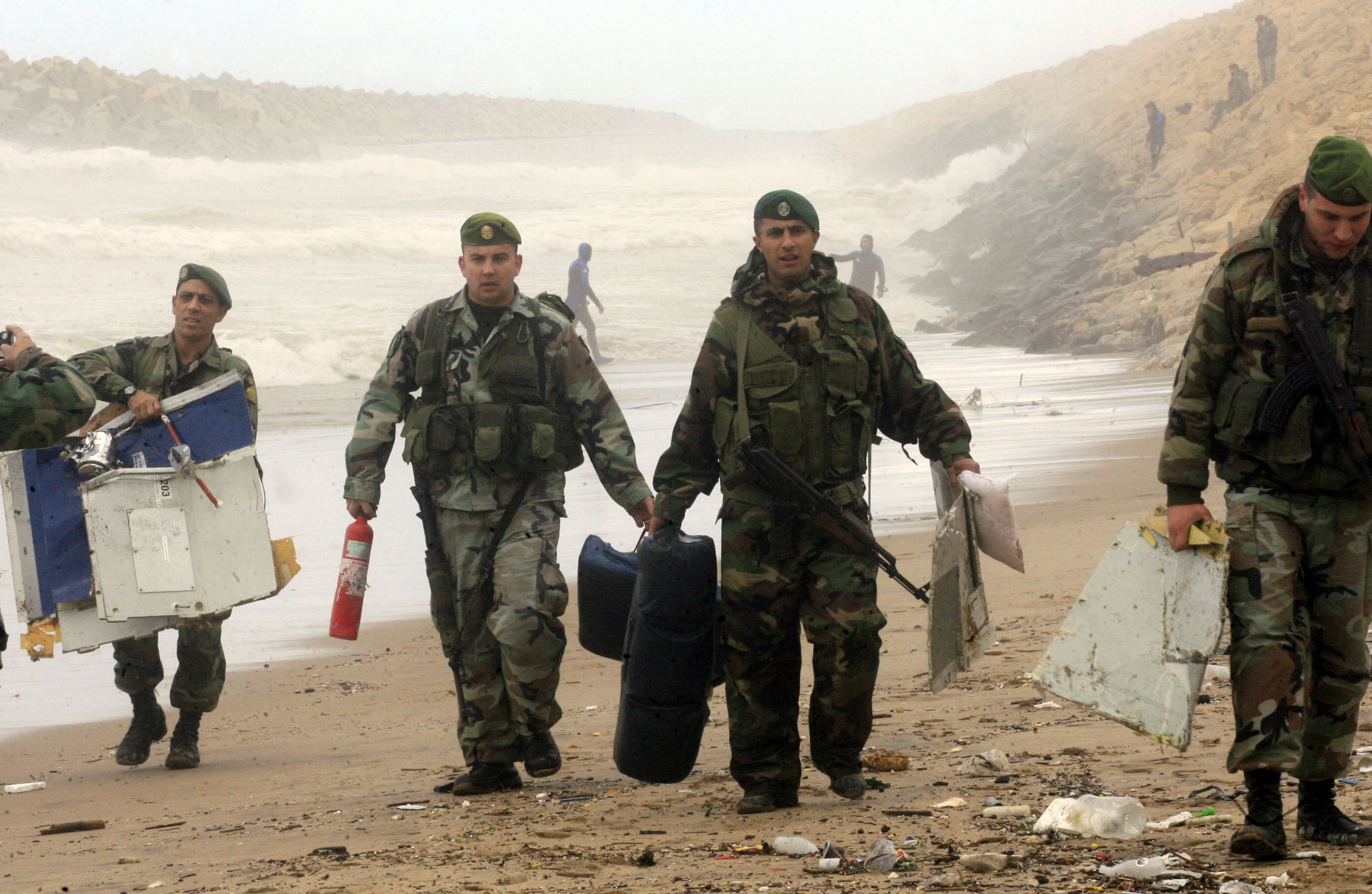 Lebanese army troops inspect the debris Lebanese army troops inspect the debris